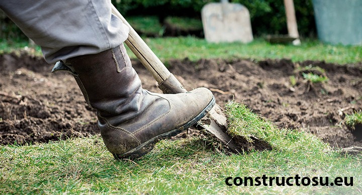 Înlăturarea vegetației înainte de pregătirea solului pentru construcție